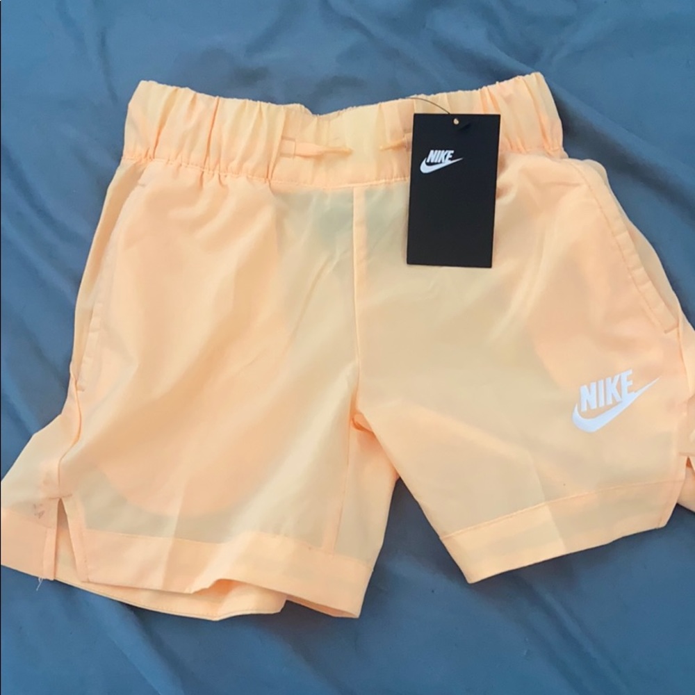 Nike shorts NWT. ORANGE
